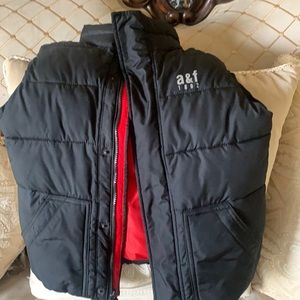 Black/ Red vest. Size 9/10 kids